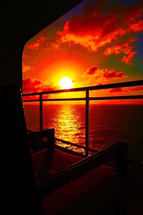 cruise balcony sunset